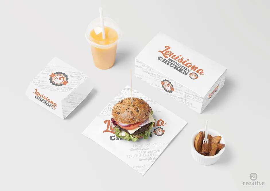 Packaging de take away con hamburguesa, patatas fritas y refresco sobre la mesa