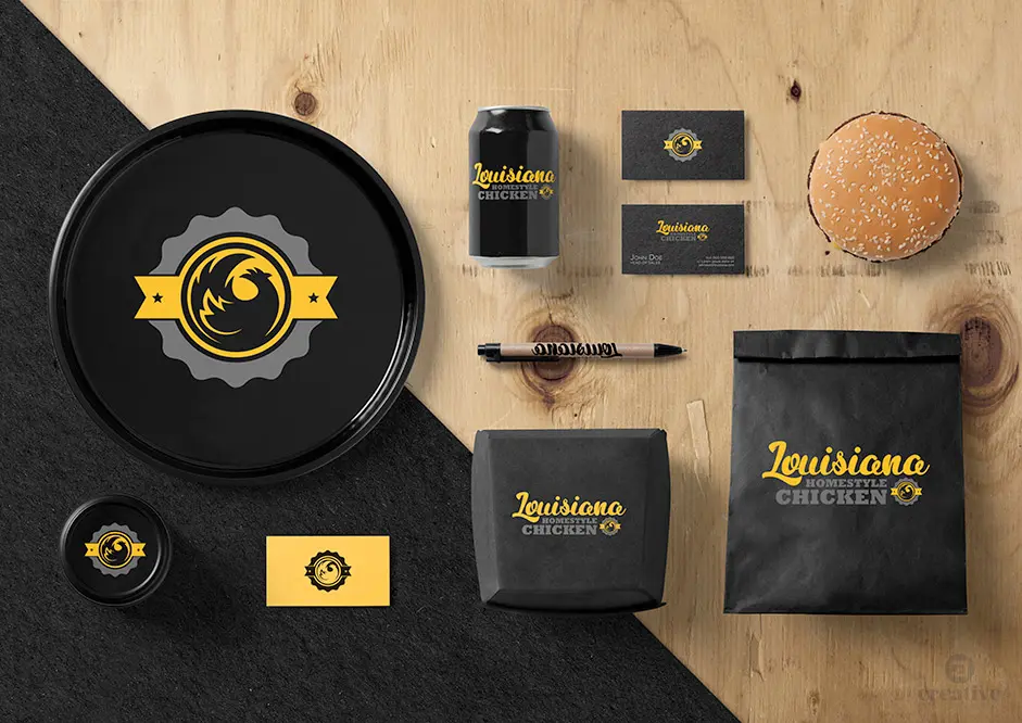 Bandeja, lata, tarjetas y bolsa de papel con el logotipo en negro y amarillo