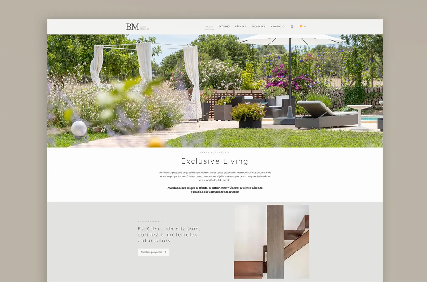 Website homepage with the outdoor garden and lounge area of a villa
