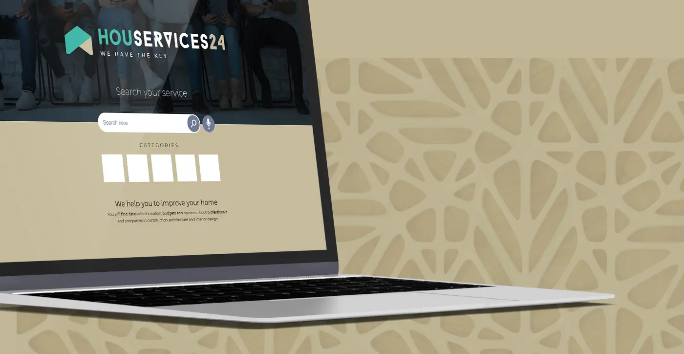 Mockup of the logo applied to the website homepage on a laptop