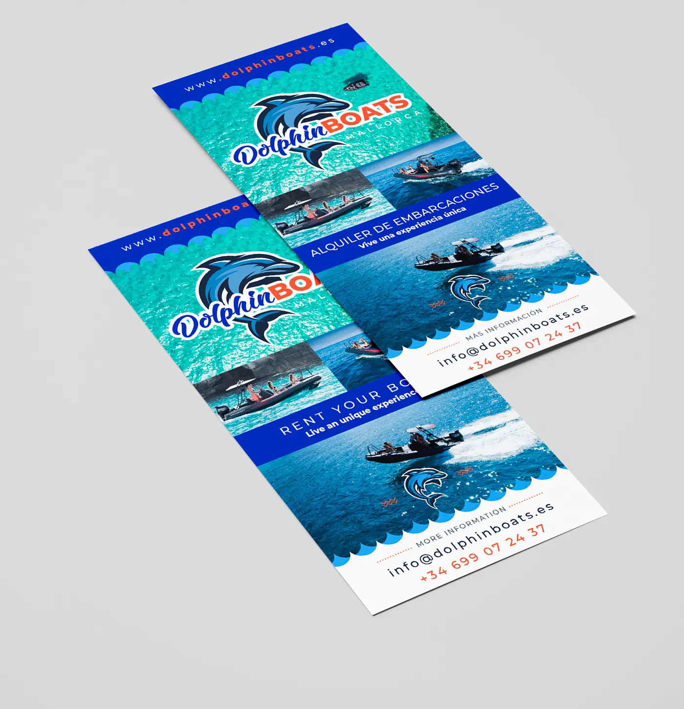 Dos folletos publicitarios de Dolphin Boats en español e inglés con fotos de lanchas