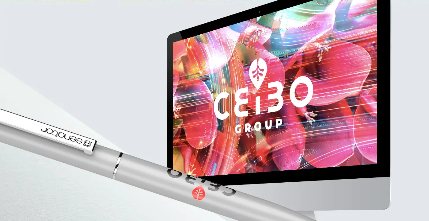 Mockup of the Ceibo Group logo on a computer screen next to a corporate pen