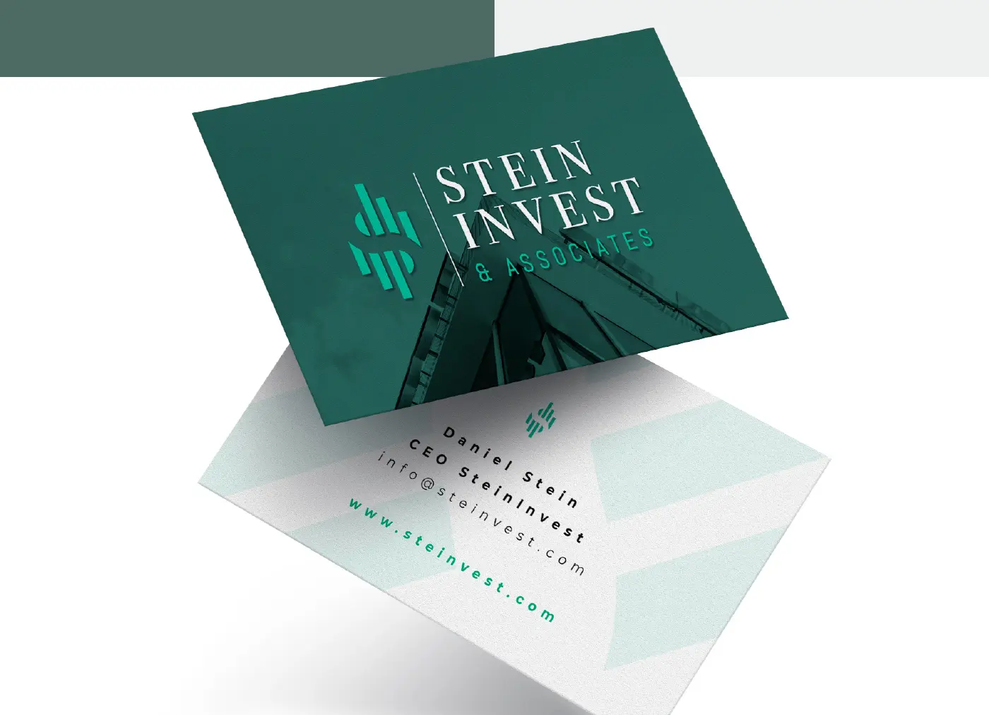 Dark green business cards with the logotype over a skyscraper photograph