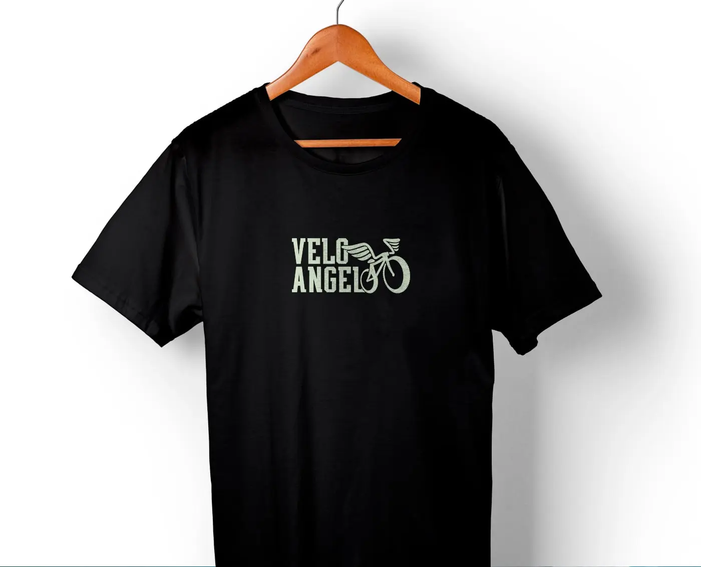 Black T-shirt with the embroidered logotype of the winged bicycle