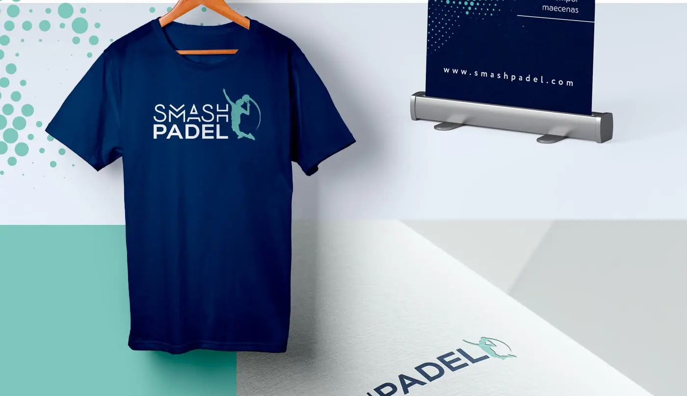 Mockup of a navy blue T-shirt, roll-up and stationery with the logotype