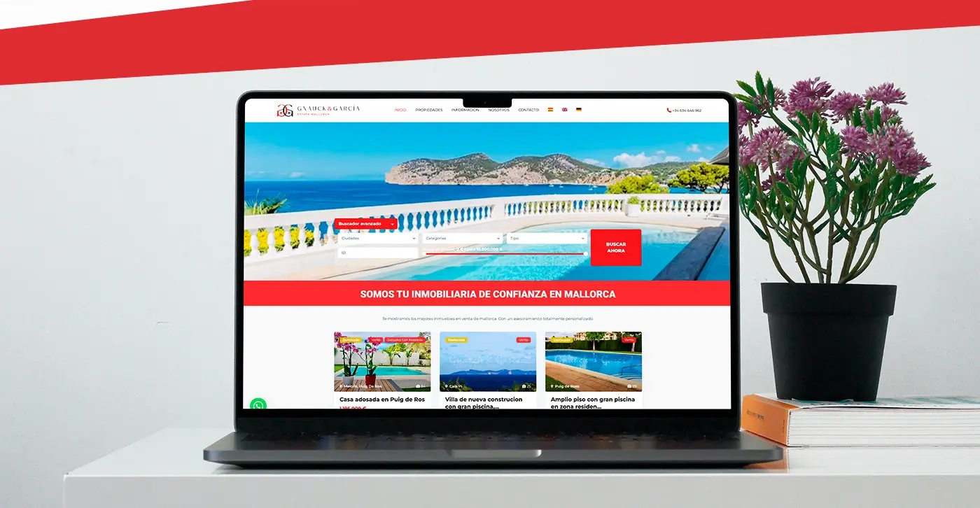 Laptop mockup with the real estate website and a villa with sea views