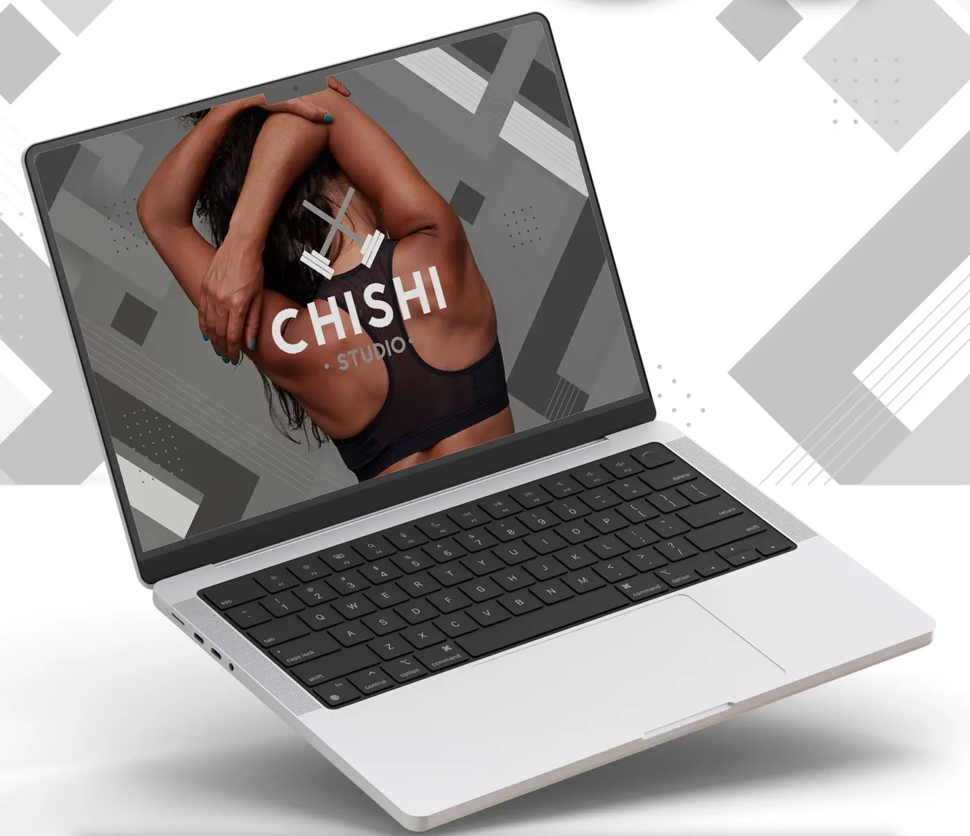 Laptop mockup showing the website home page with an athlete and the logo overlaid