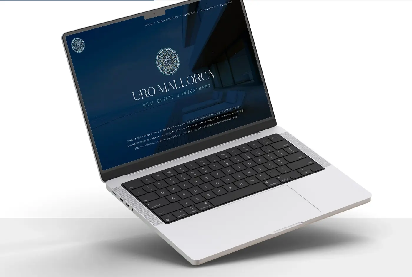 Laptop with the website homepage in navy blue tones