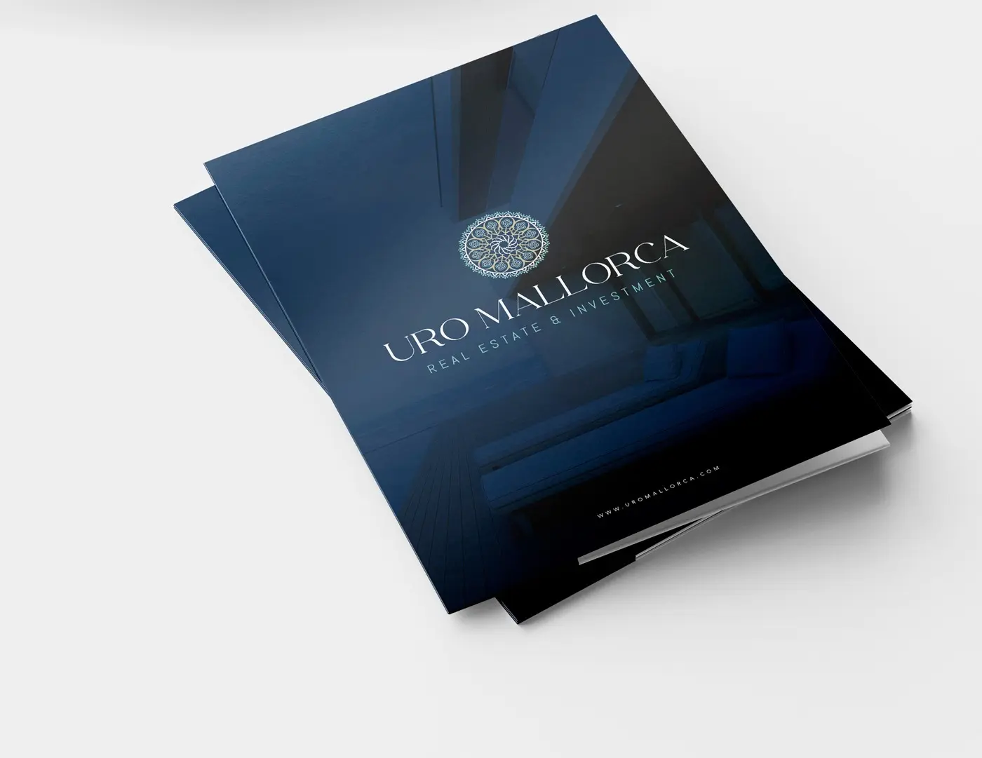 Navy blue corporate dossier with the logotype and a luxury interior design photograph