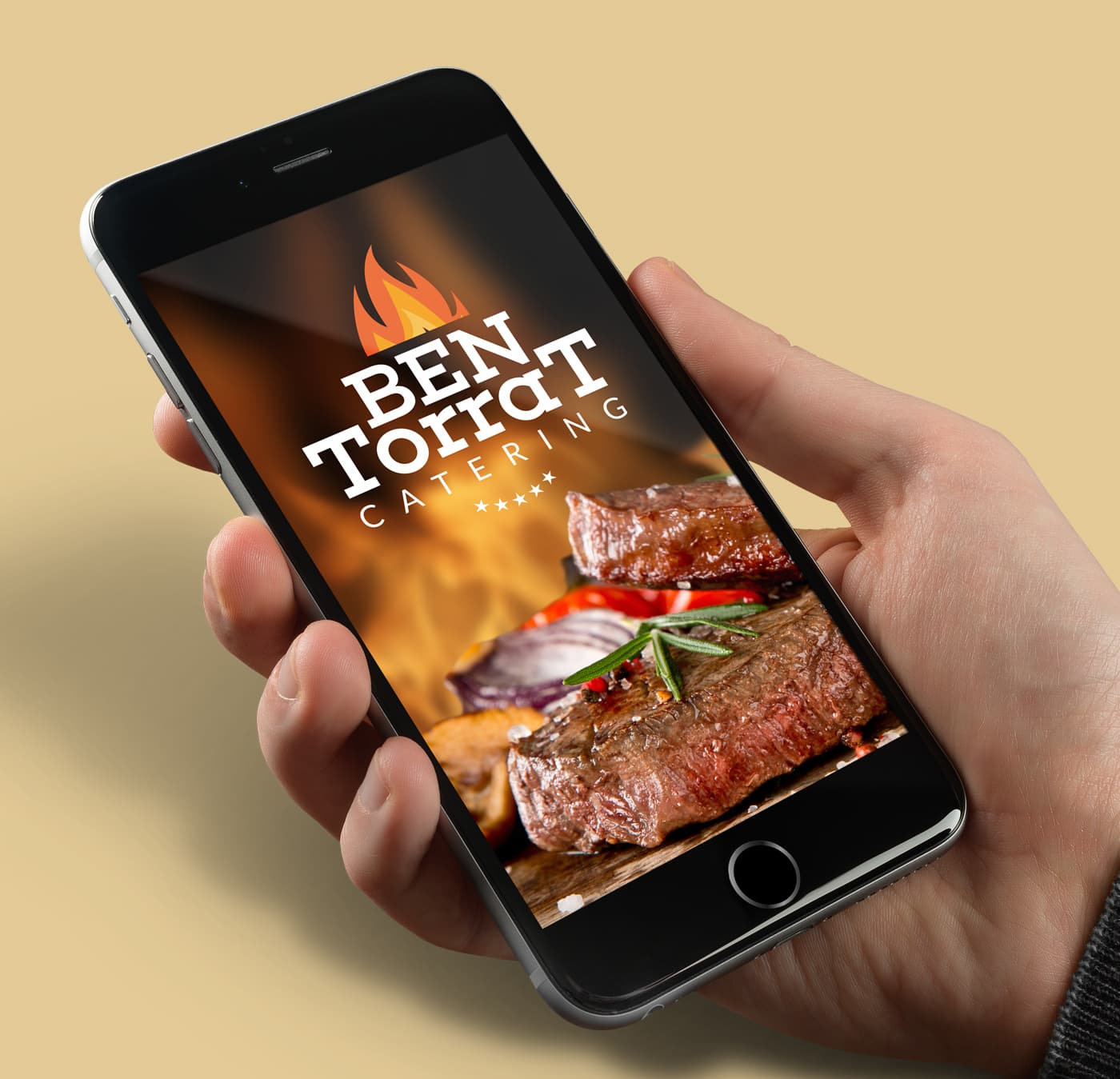 Pantalla de móvil con el logotipo de llama de Ben Torrat Catering