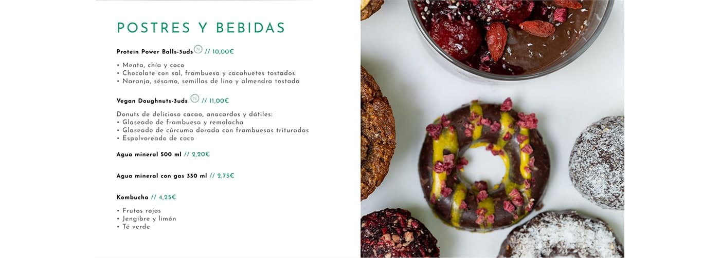 Secció de postres amb donuts vegans glacejats de colors