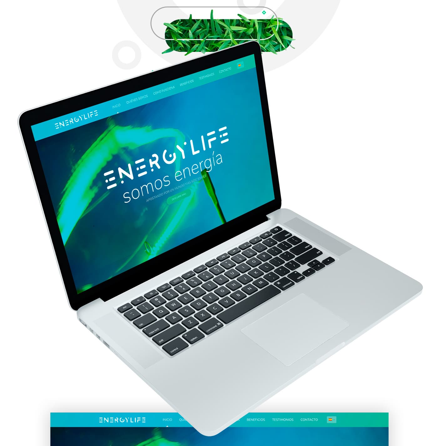 Portátil mostrando la home de la web con el logotipo animado en verde sobre fondo azul