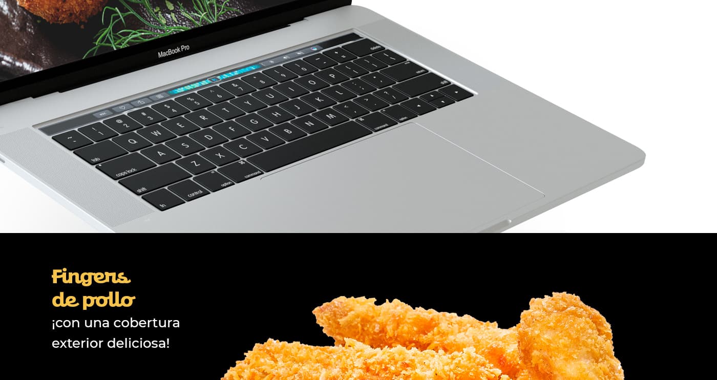 MacBook Pro abierto junto a fingers de pollo empanados