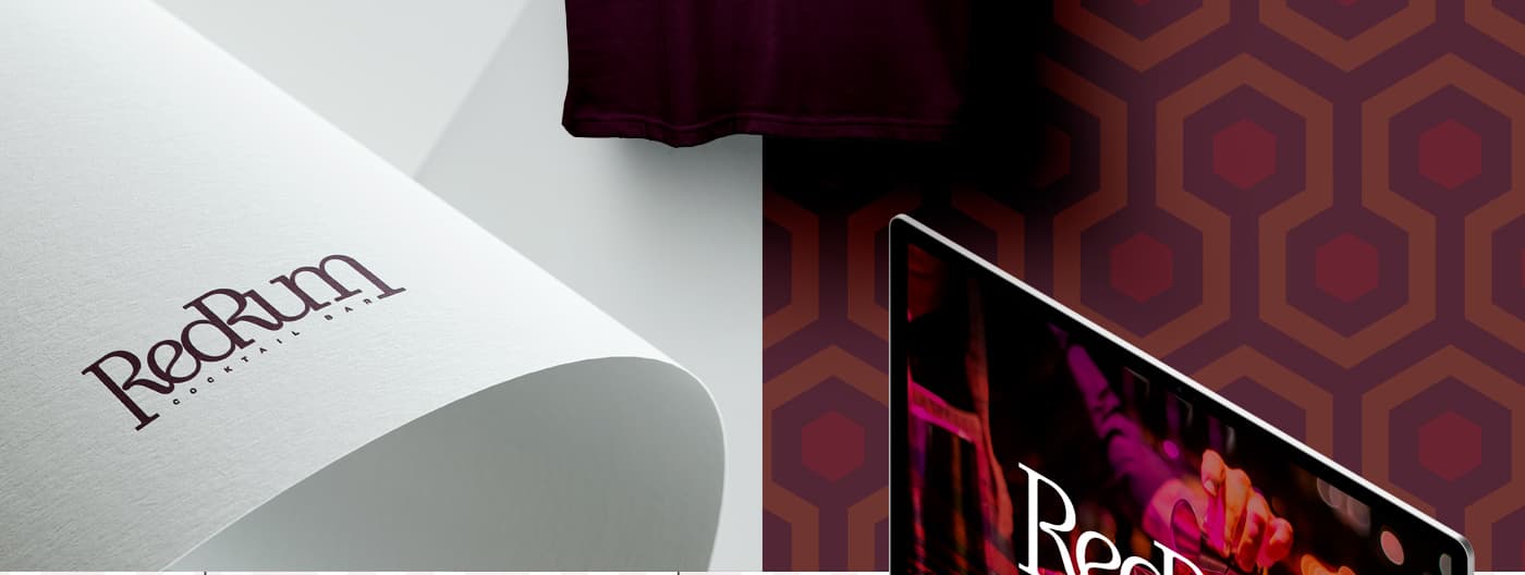 Papel con el logotipo impreso junto a una pantalla con el patrón hexagonal de fondo