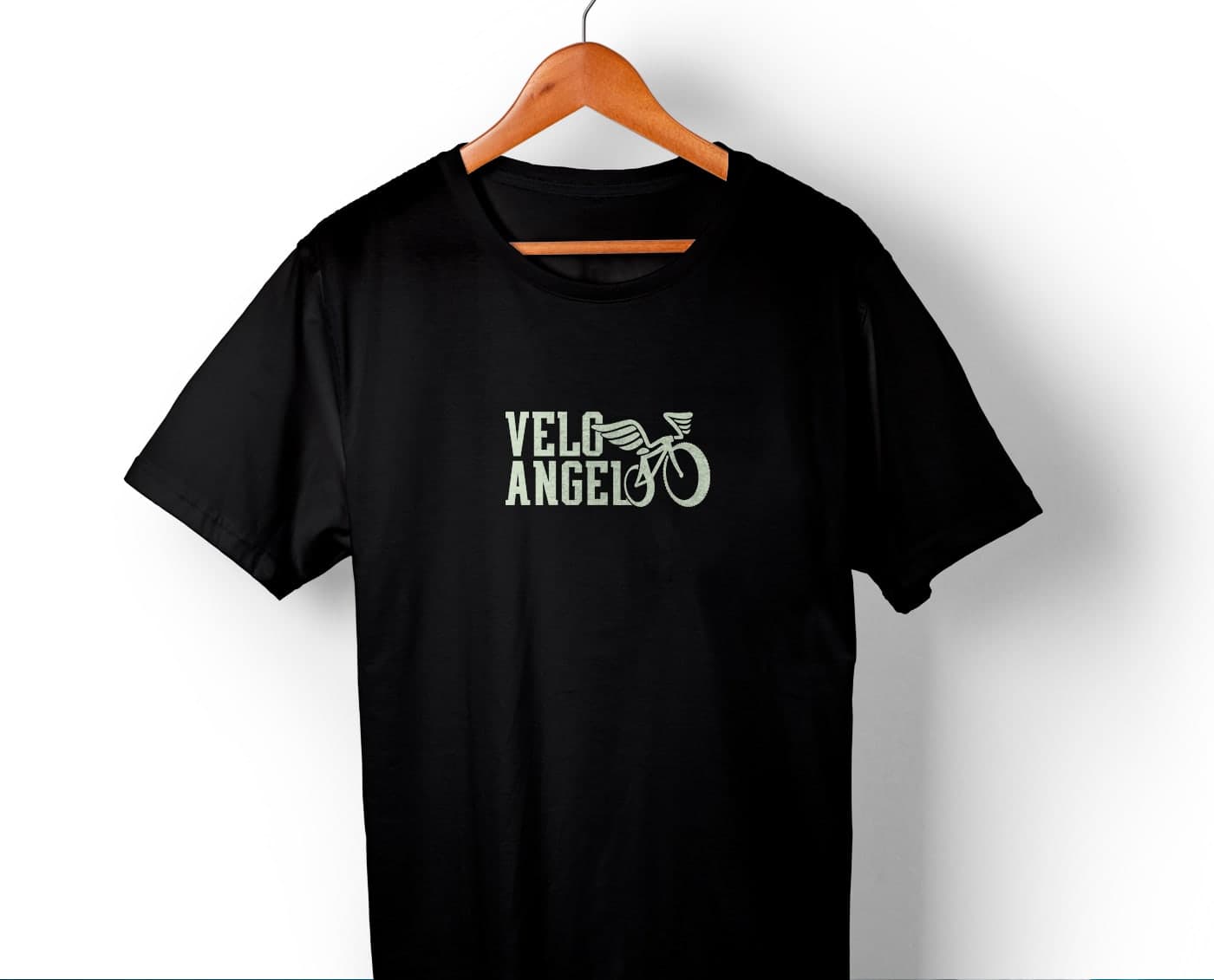 Black T-shirt with the embroidered logotype of the winged bicycle