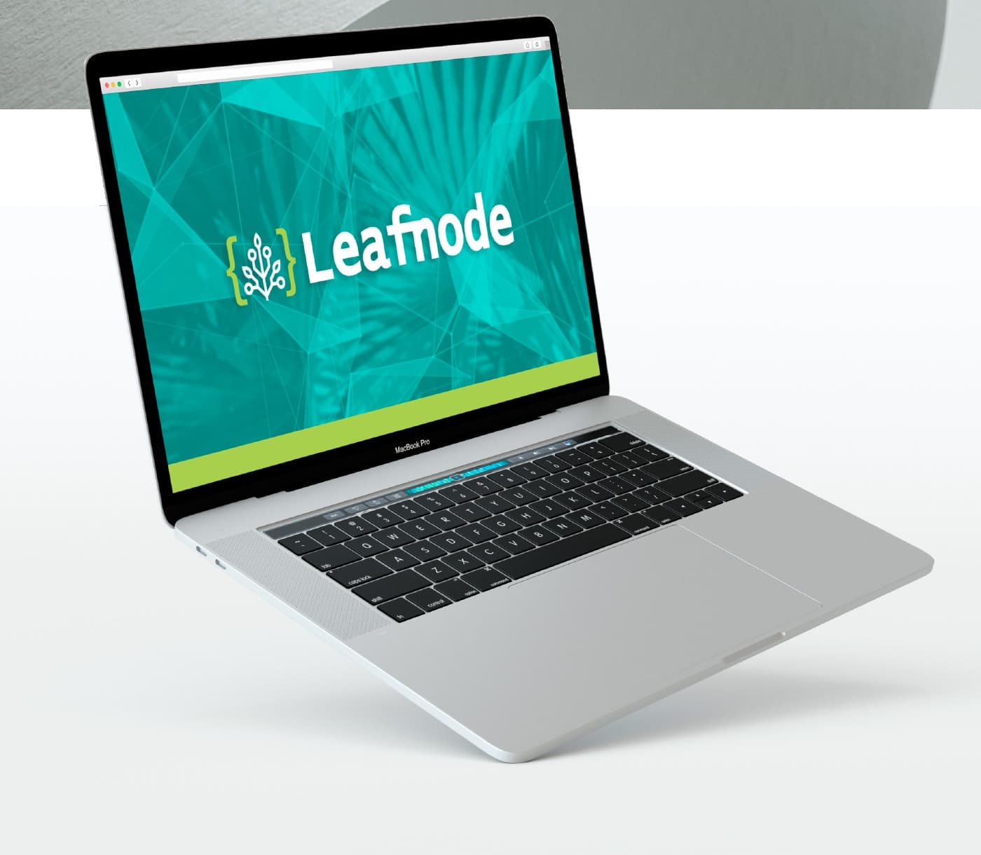 Maqueta del logotip Leafnode a la pantalla d'un portàtil amb fons turquesa de fulles