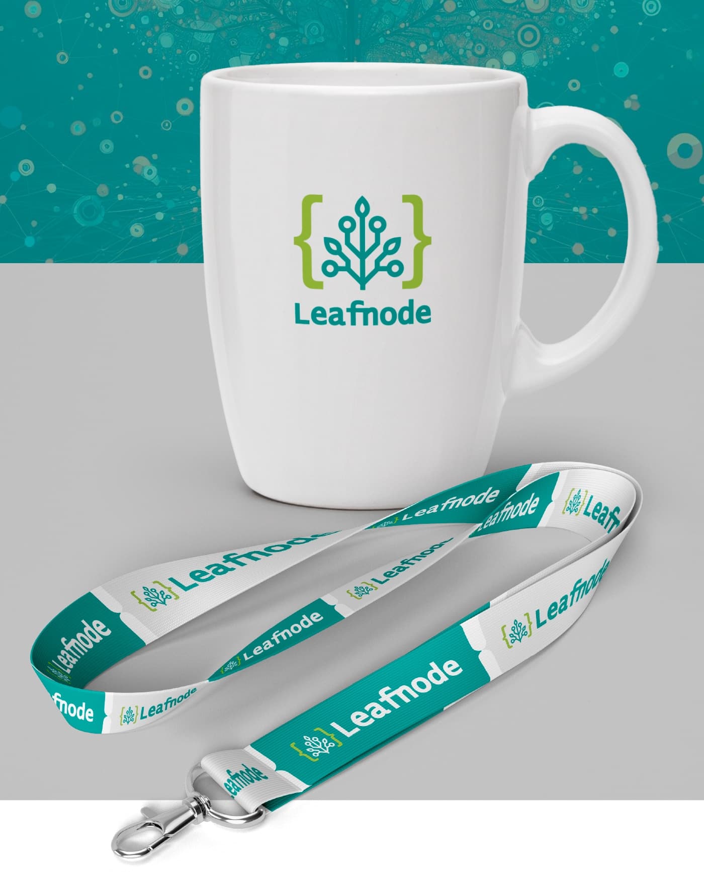 Maqueta del logotip Leafnode aplicat a una tassa blanca i a cordons identificatius