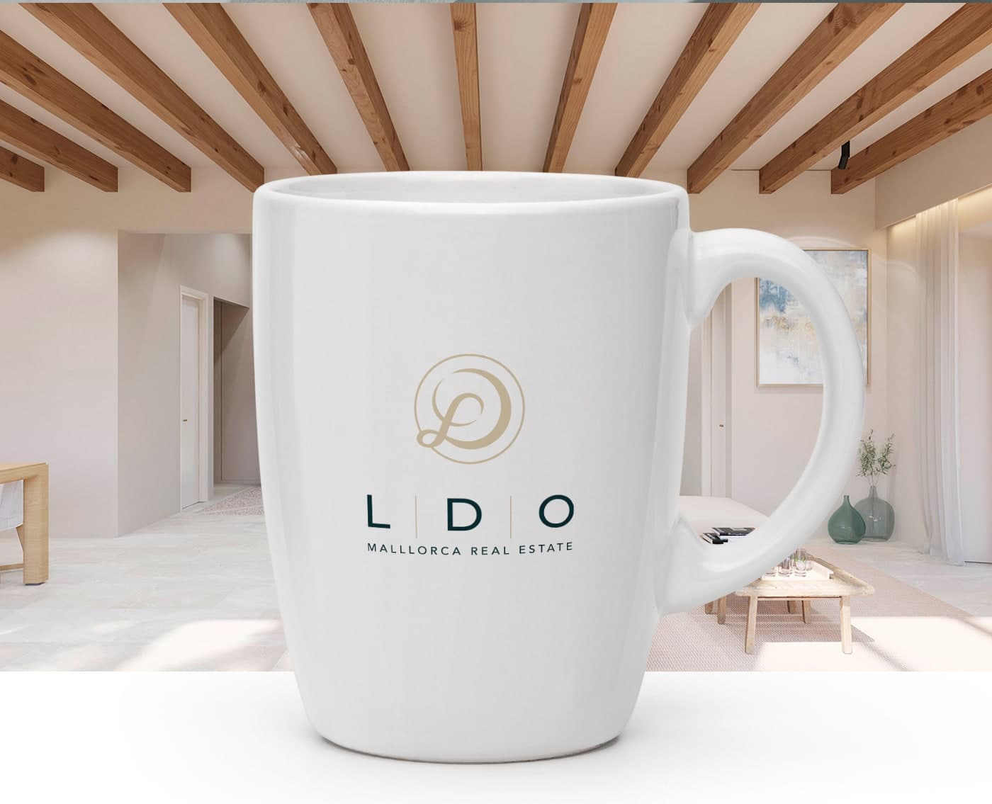 White ceramic mug with the gold LDO Mallorca logo