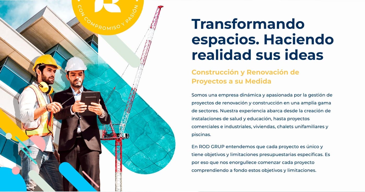 Dos professionals de la construcció amb casc junt a una grua