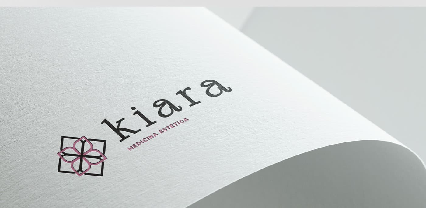 Macro detail of the Kiara logo embossed on paper
